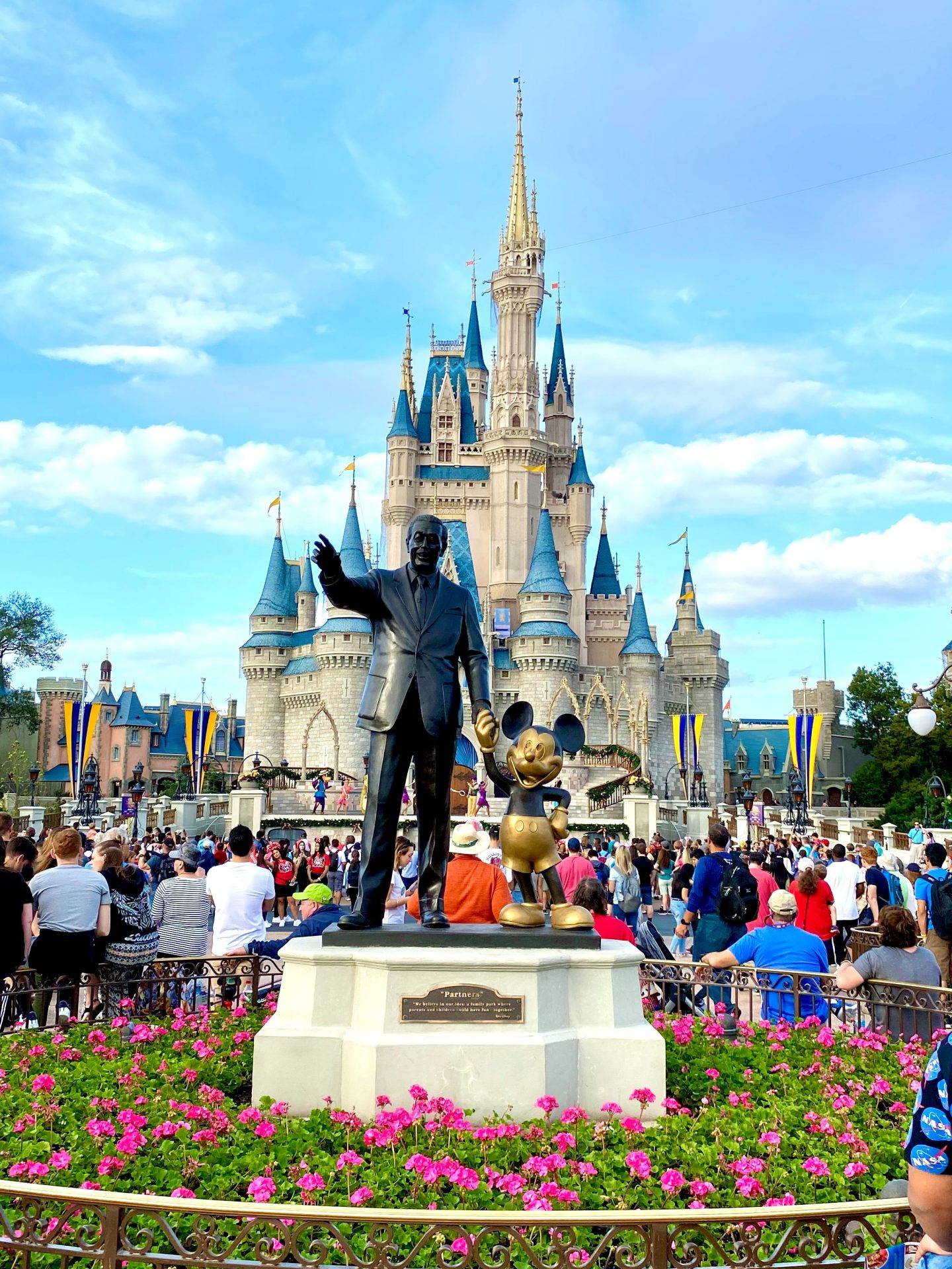 The Disney World Orlando Castle, with the Walt Disney statue in front