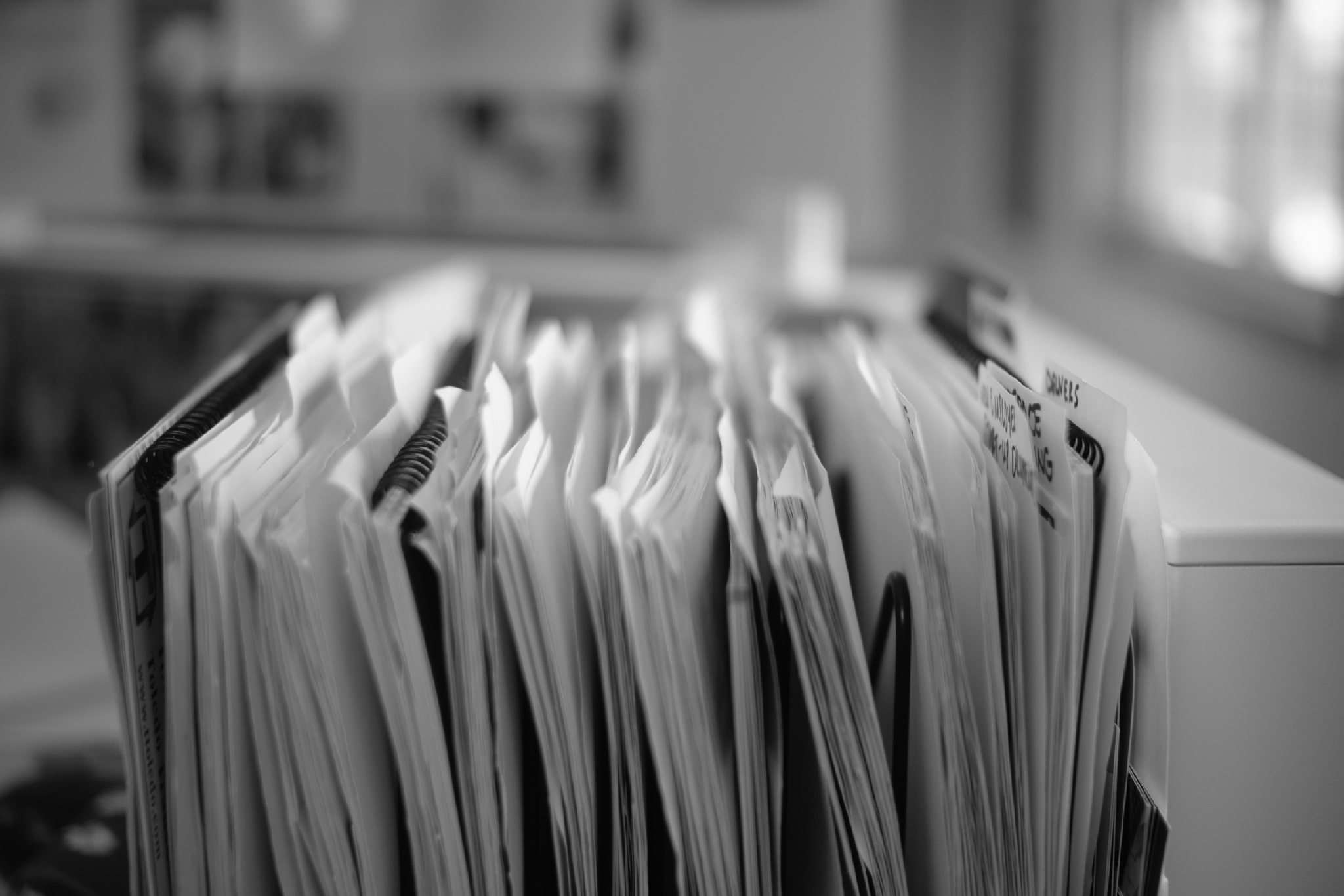 folders filed on a desk
